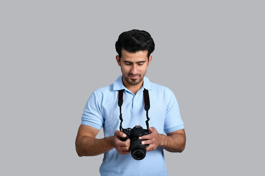 a man holding a camera